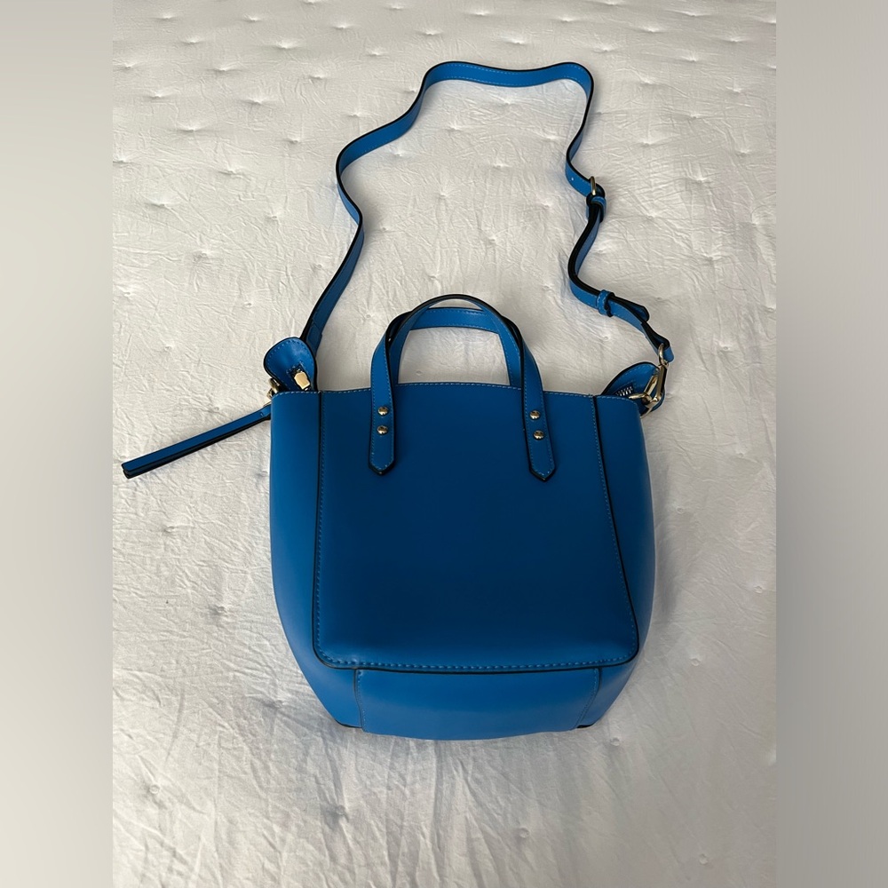 Blue medium cross body tote. Never used.